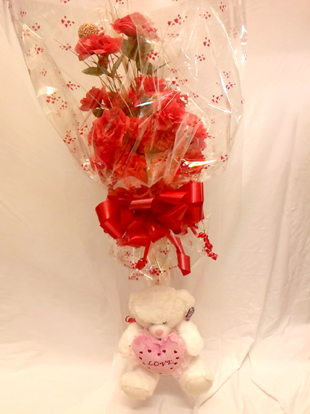 Teddy with large bouquet